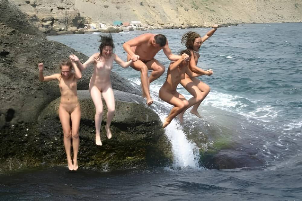 Mens and girls nudists on a beach - A true nudist vacation
