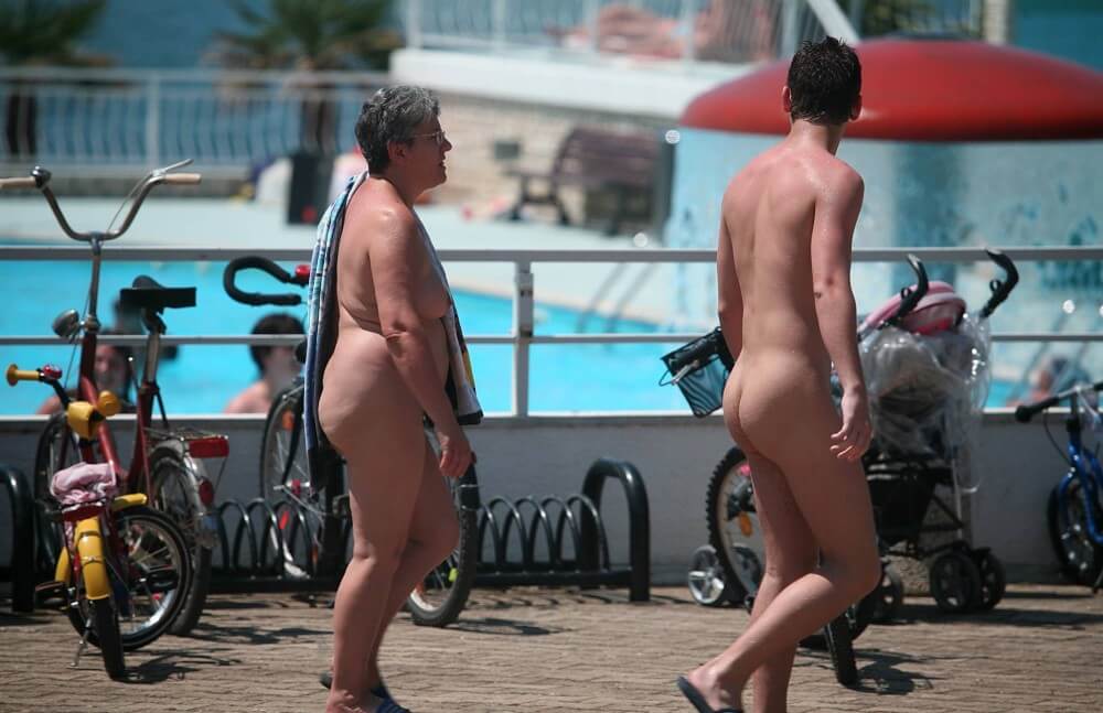 Sun-Soaked Sidewalk pics - Nudism and natural harmony