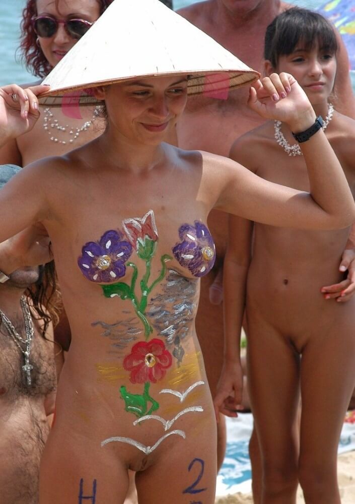Nudist gathering on the beach video - Melting under the scorching sun, I sunbathe naked