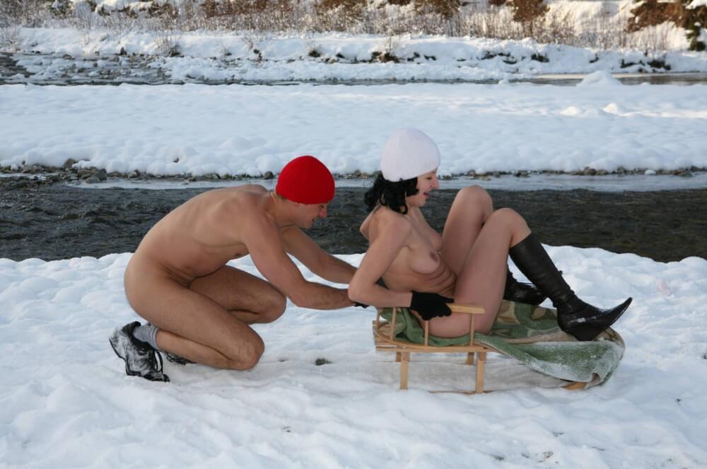 Naturist Girl Snow Day Couples Sled pics - Nudists only allowed