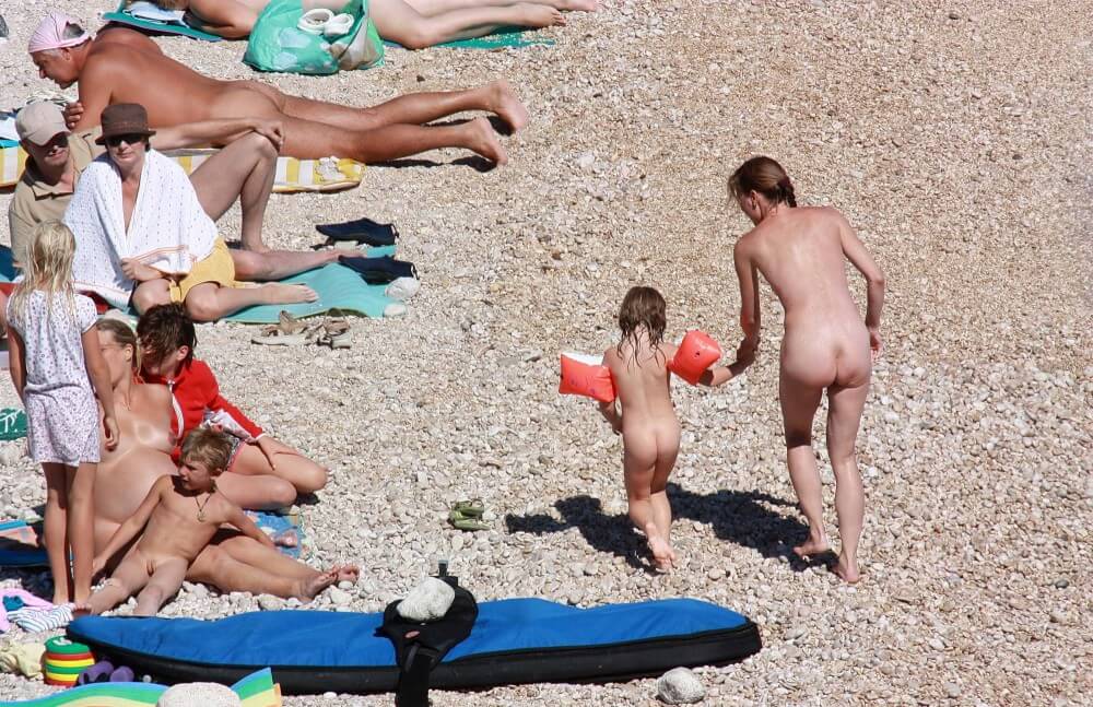 Orange Floaty Safety First Naturist pics - Nudity is an expression of naturalness and sincerity