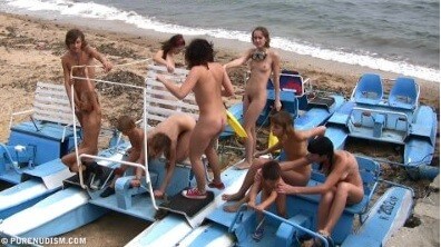 A group of naturists at sea - Nudism improves health and boosts self-esteem