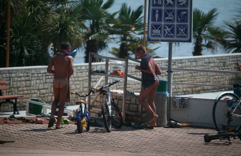 Nudism in a German water park photo - In naturism, nature serves as the bodys natural clothing