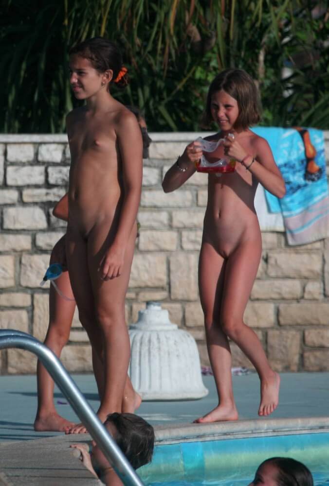 Two Poolside Nudist Girls pics - Nudity fosters trust and mutual understanding among people